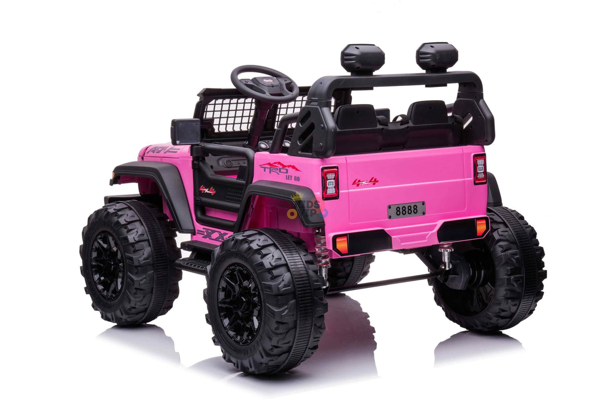 The Pink 24V/4WD Xtreme Ride on Truck features rugged construction with Eva wheels, leather bucket seats, a roll cage, rear spare tire, side mirrors, and 8888 license plate. It includes parental remote control for safety, making it ideal for adventurous kids.
