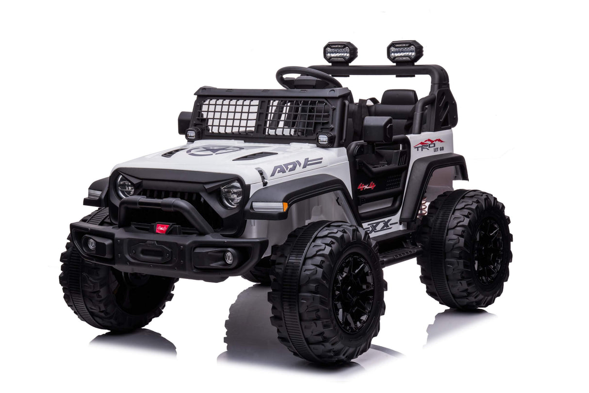 The White 24V/2WD Xtreme Edition Ride-on Truck, with EVA wheels and leather seats, features rugged roll bars, a front grille, lights, steering wheel, and hood logo. This two-seater is perfect for kids outdoor adventures.
