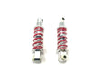 Displayed against a white background, the 12V UTV Sport XMX Suspension Shocks feature two silver bodies with vibrant red springs and mounting points at each end. Ideal for ride on cars, they are final sale items. Contact us for more details!.