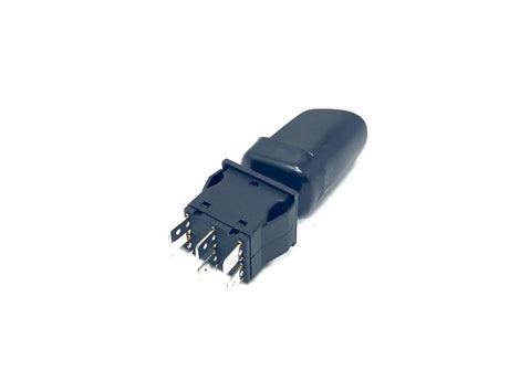 Close-up of a 12V McLaren 720 Shifter—a black plastic component with metal pins extending from one end. It has a cylindrical body and rectangular base with multiple pins, set against a plain white background.