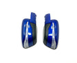 The 12V Mercedes X Class Pair of Mirrors features shiny blue side mirrors with black accents and integrated turn signals, shown facing each other on a white background. Ideal for upgrading your ride-on car experience. Final Sale—contact us to learn more!.