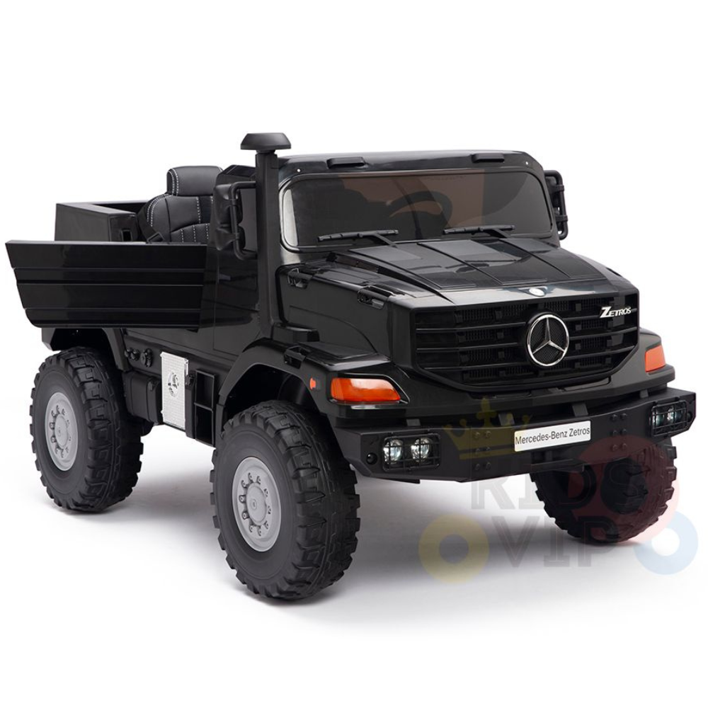 The Black 24V XXL Mercedes-Benz Zetros Kids Ride On Truck with RC features large wheels and a detailed front grille, offering realistic off-road capabilities and a sturdy design perfect for imaginative play.