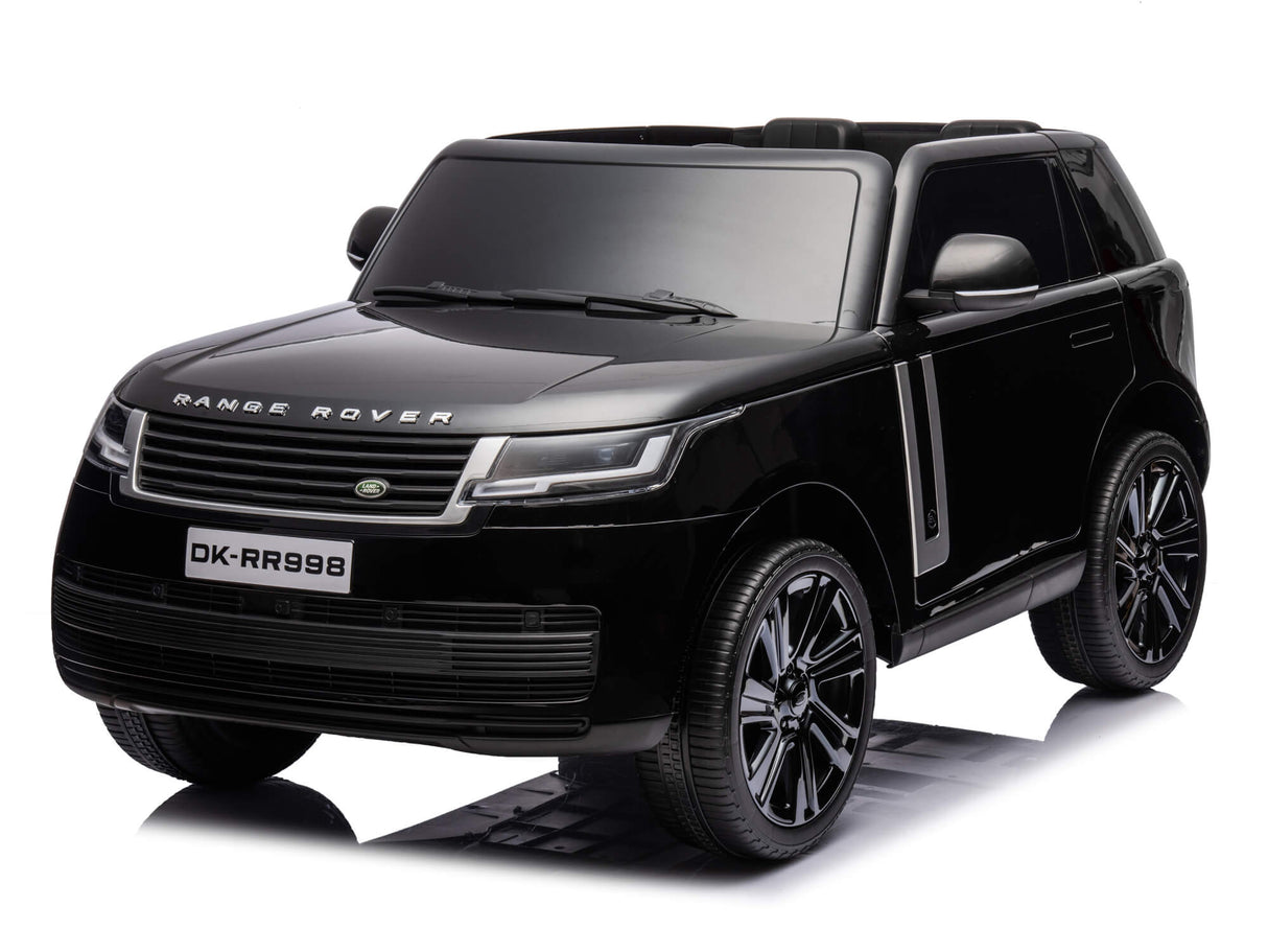 A realistic black 24V Kids Range Rover ride-on SUV, featuring shiny wheels and a remote for parental control, sports the front license plate DK-RR998.