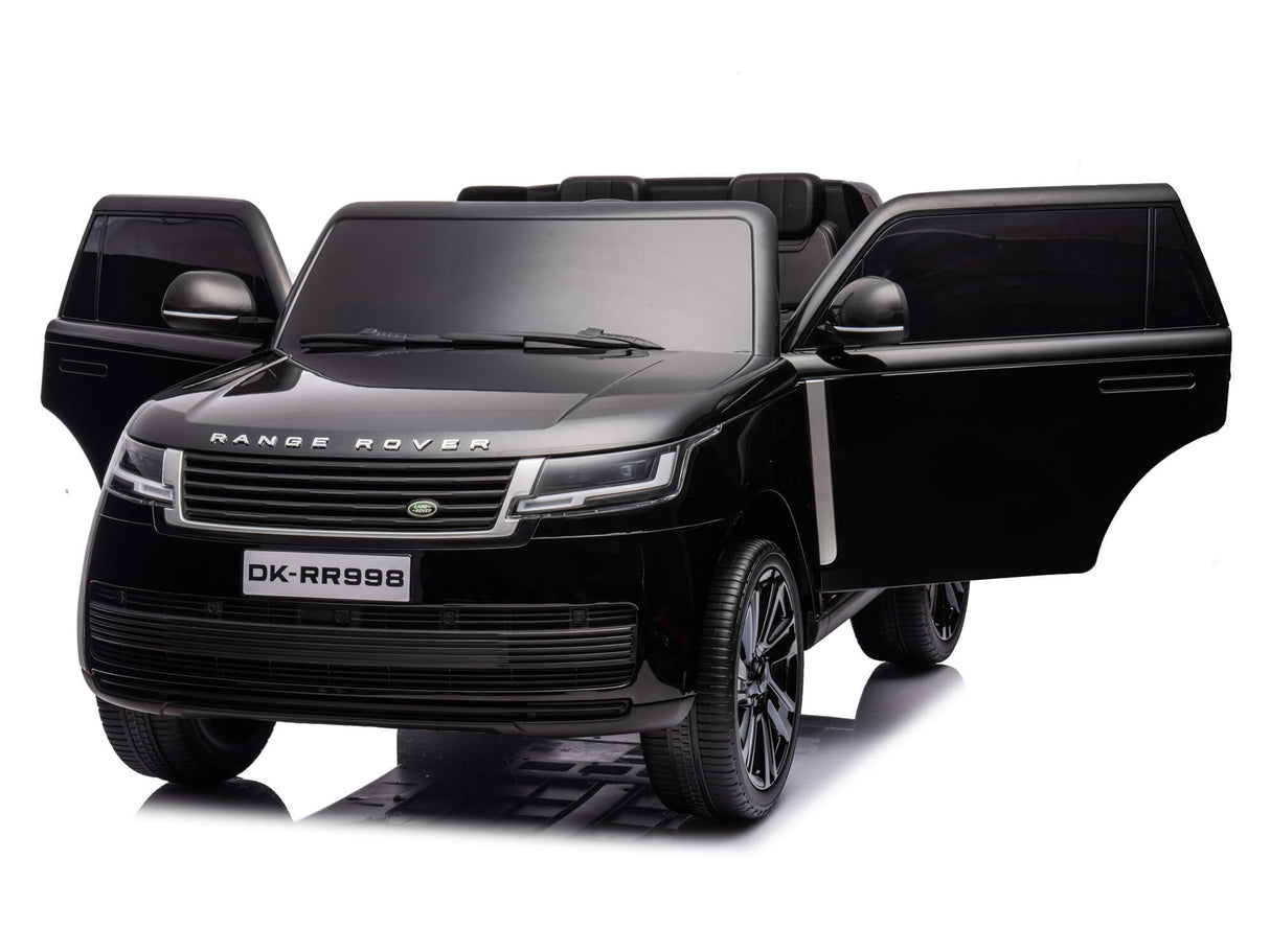 A black 24V Kids Range Rover ride-on SUV, model DK-RR998, is displayed with open front doors. It has detailed features like headlights and grille on a reflective surface and offers premium features with parental remote control for adventurous play.