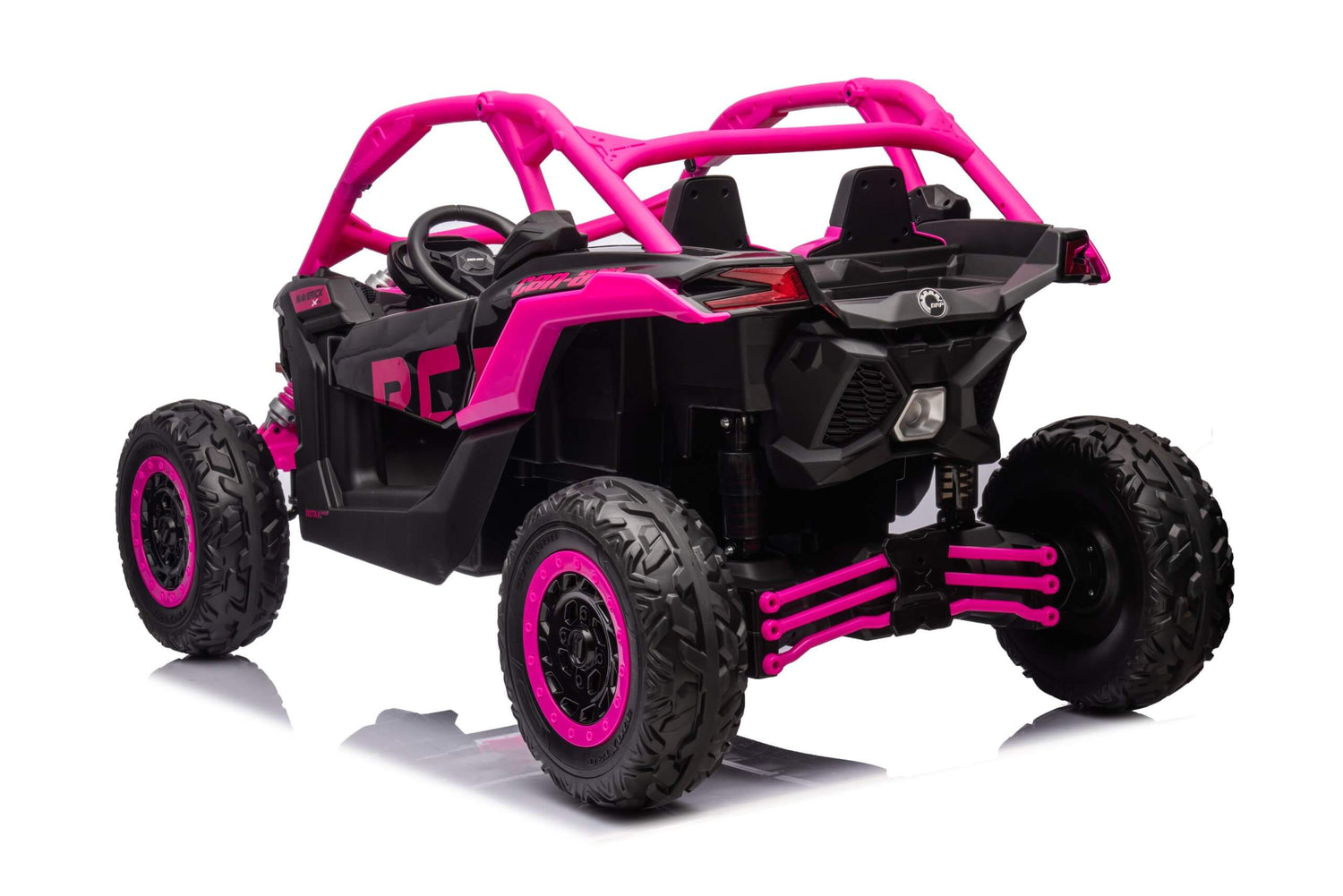 The Rose 2x24V/4WD Official Can-Am Maverick Ride on Buggy, LX Performance, is a vibrant pink and black 2-seater with large tires, roll cage, sporty design, RC branding, and realistic suspension. It sits on a white reflective surface showcasing its advanced features.