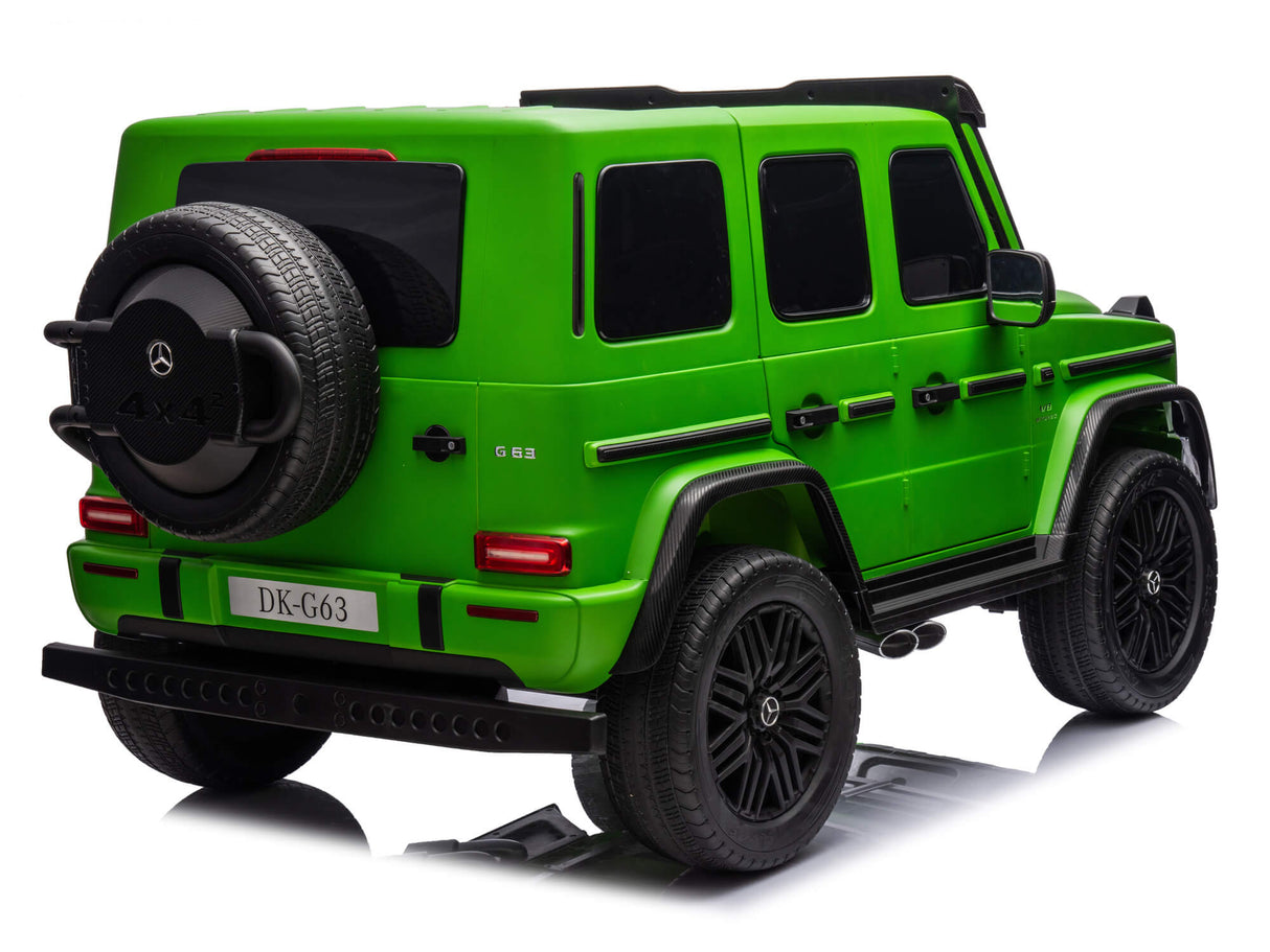 A green Mercedes G63 XXL 24V Kids Ride-On Truck – Platinum Edition is showcased on a white background. It has remote control, black wheels, side mirrors, a spare tire at the back, leather seats, EVA tires, dual batteries, 4WD capability, and a license plate reading DK-G63.