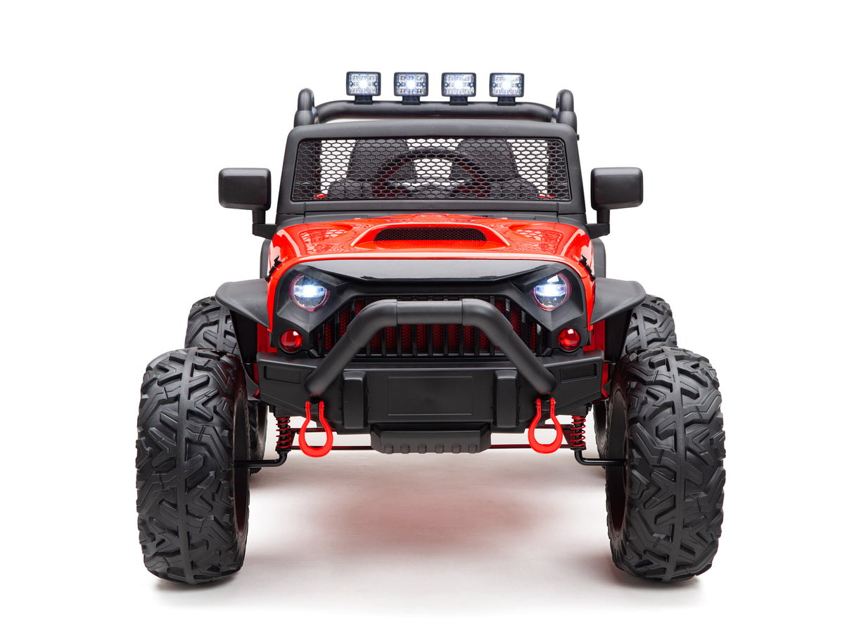 The Red 24V EVA Big Wheels Kids 1 Seater Upgraded Ride On Truck features a rugged design with large tires, bold black accents, and hardware details. It includes a row of four lights on top, netting across the windshield, and a powerful 24V battery for extended fun.