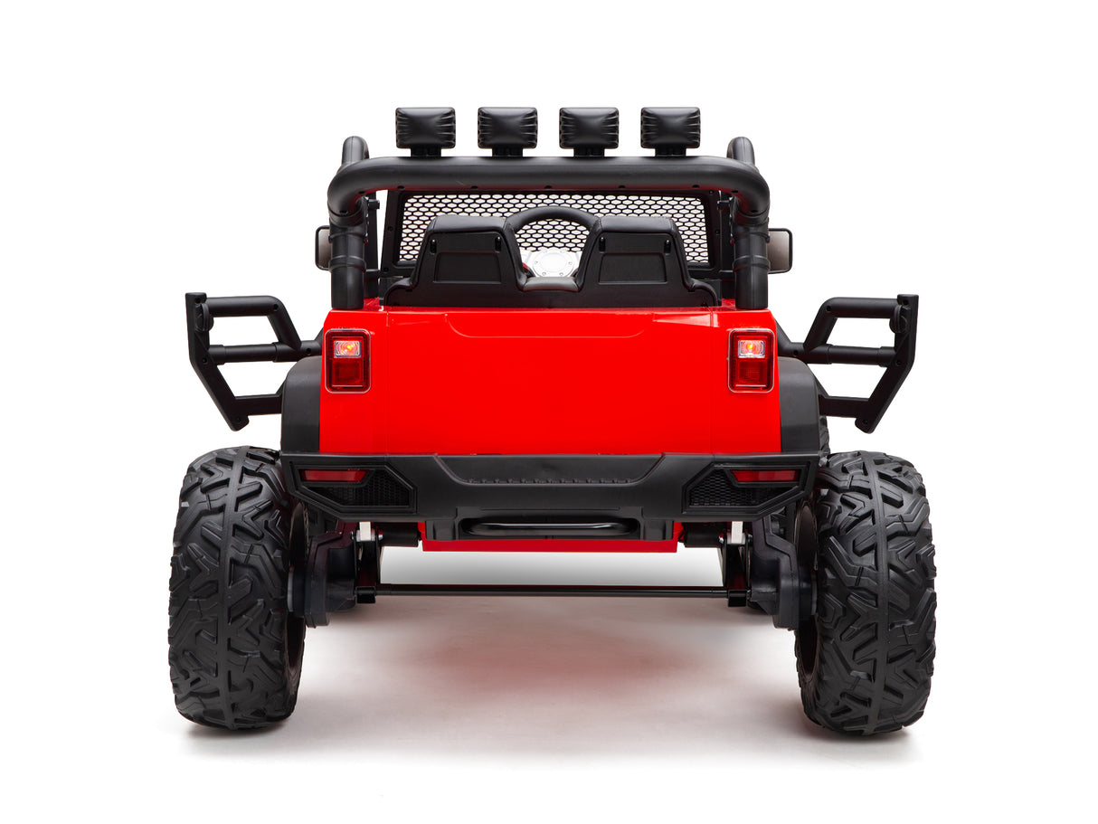The rear view of the Red 24V EVA Big Wheels Kids 1 Seater Upgraded Ride On Truck shows off its off-road design with large rubber wheels, a spare tire, roll bars, and a small seating area. It operates on a powerful 24V battery against a plain white background.