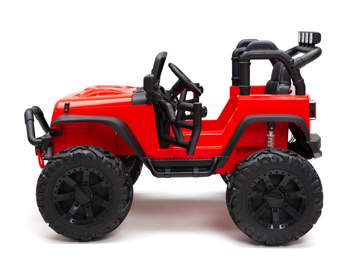 The Red 24V EVA Big Wheels Kids 1 Seater Upgraded Ride On Truck is shown in profile on a white background, featuring large black rubber tires, detailed interior elements like steering and seats, a powerful 24V battery, off-road styling with visible exhaust pipes—ideal for adventurous kids.