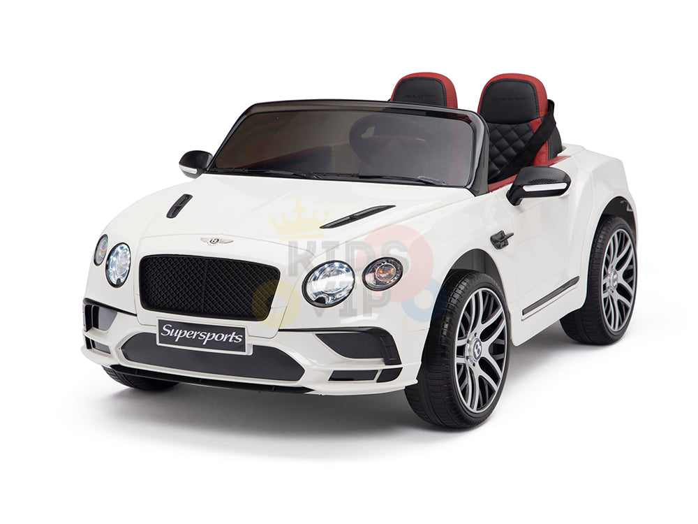 White toy car with sleek design, resembling luxury sports car, features black and red seats, detailed grille, and shiny wheels. Labeled Supersports, similar to Bentley kids ride-on with 12V remote control. Officially named the White 12V Bentley GTC Kids Licensed Ride-On Car with Rubber Wheels.
