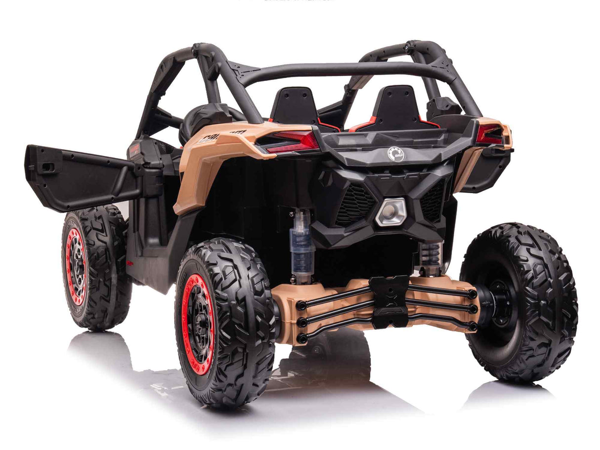 The 2 Seater Official 2x24v Can-Am Maverick RS Ride-on Buggy, LX Performance 4WD Edition, sports a realistic off-road design with large rugged tires and a sturdy frame. Seen from the rear with the left door open, interior details are visible, and its reflection gleams on the white surface below.