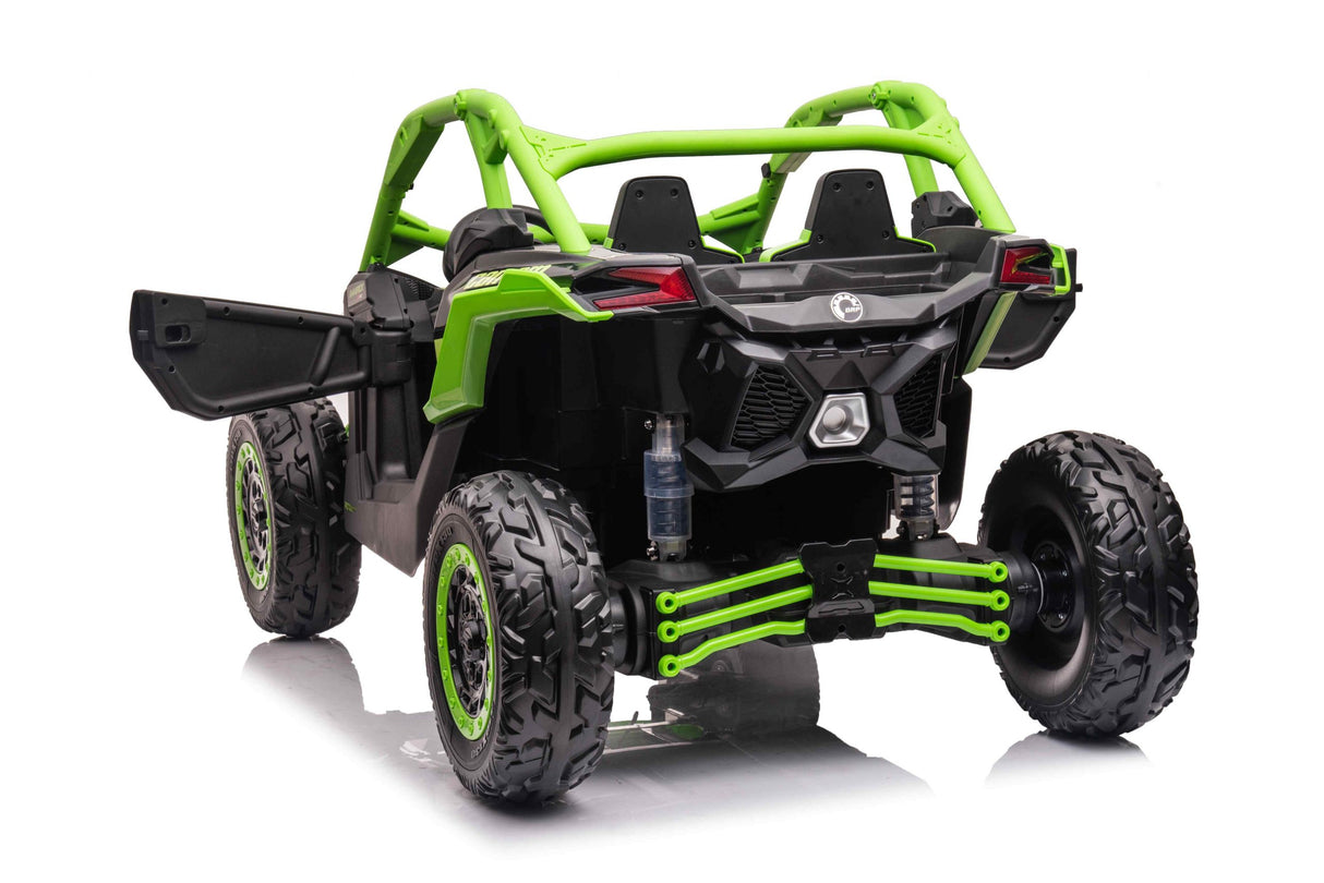 The Green 2 Seater Official 2x24v Can-Am Maverick X Ride on Buggy, LX Performance 4WD Edition, off-road vehicle is displayed in green and black with large rugged tires. Seen from the rear, it features an open-frame design and a partially open drivers side door against a plain white background.