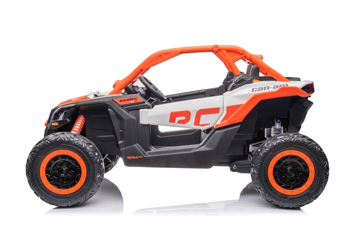 Side view of the Orange 2x24V/4WD Official Can-Am Maverick Ride on Buggy, LX Performance, showcasing large tires, an exposed frame, and RC door logo. With a sporty design and eco leather seats, this buggy is ready for rugged terrain.