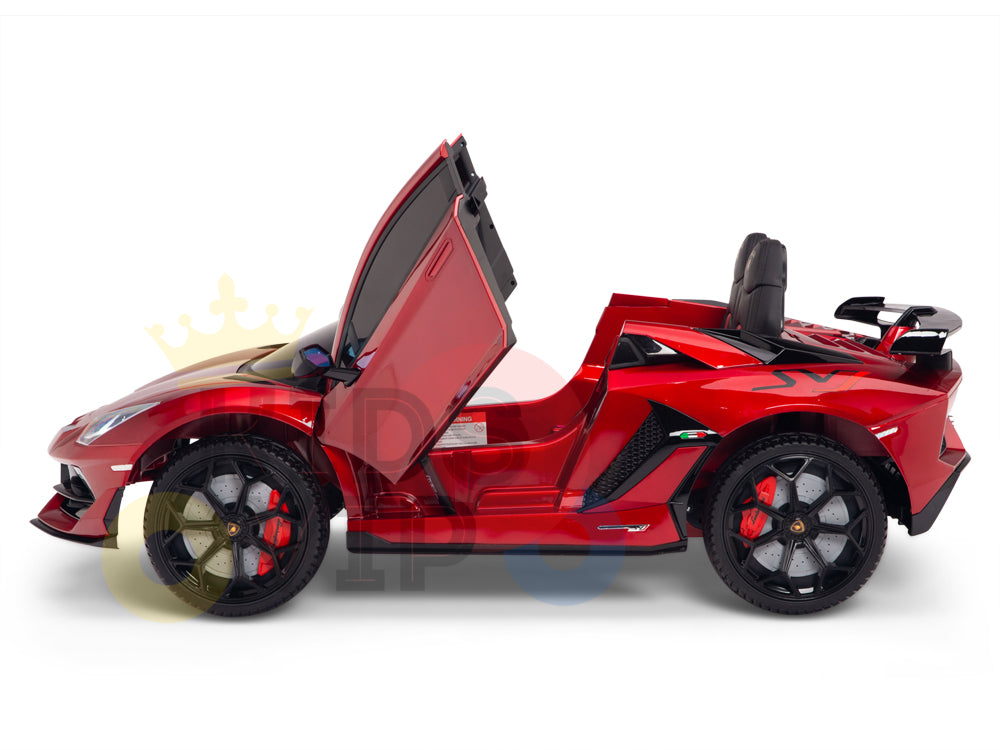 The Burgundy Red 12V Lamborghini SVJ Sport Kids Licensed Ride On Car features butterfly doors, detailed black wheels, modern aerodynamic design, and an authentic sporty look. This one-seater is perfect for young thrill-seekers and includes rubber wheels and a remote.