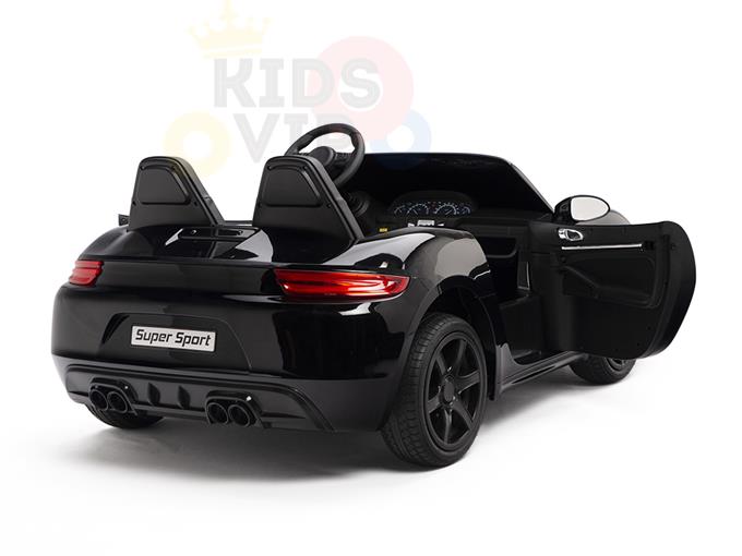 The Black 24V XXL SuperSport Big Kids Ride On Car showcases Super Sport on the rear. It boasts an open drivers side door, detailed interior with ECO leather seats, sleek lines, exhaust pipes, and modern wheels. The simple white background highlights the design of this toy sports car.