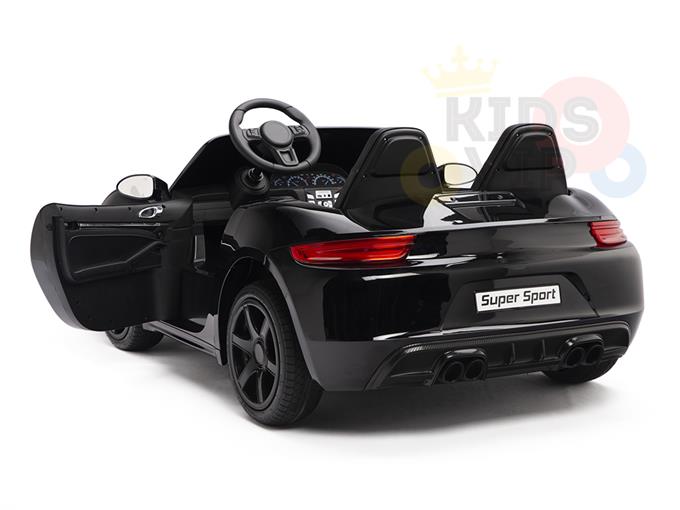 The Black 24V XXL SuperSport Big Kids Ride On Car showcases its sleek design with ECO leather seats, an open drivers side door, two seats, dashboard details, and twin exhausts. The KIDSVIP Supercar name graces the rear bumper against a faint logo backdrop.