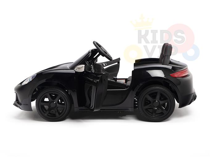 The Black 24V XXL SuperSport Big Kids Ride On Car features a sleek, convertible sports car design with real tires, detailed wheels, steering wheel, open doors, and luxurious ECO leather seats.