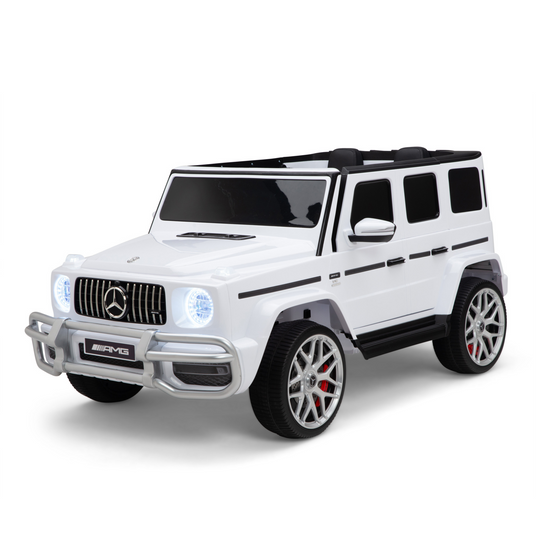 White Mercedes-Benz G63 kids’ ride-on car, shown from the front and side.