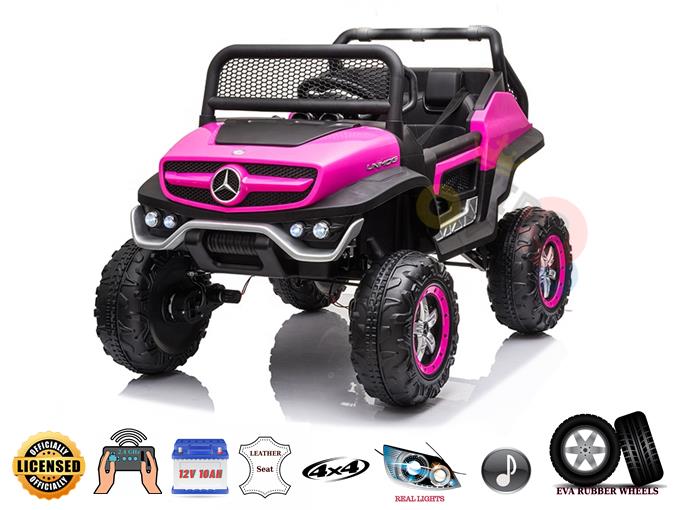 The Pink 12V/4X4 Official Mercedes Unimog Junior Ride On UTV is a pink and black off-road vehicle with large tires, a mesh grille, and metal accents. It features a leather seat, real lights, music capabilities, and can be guided via remote control.