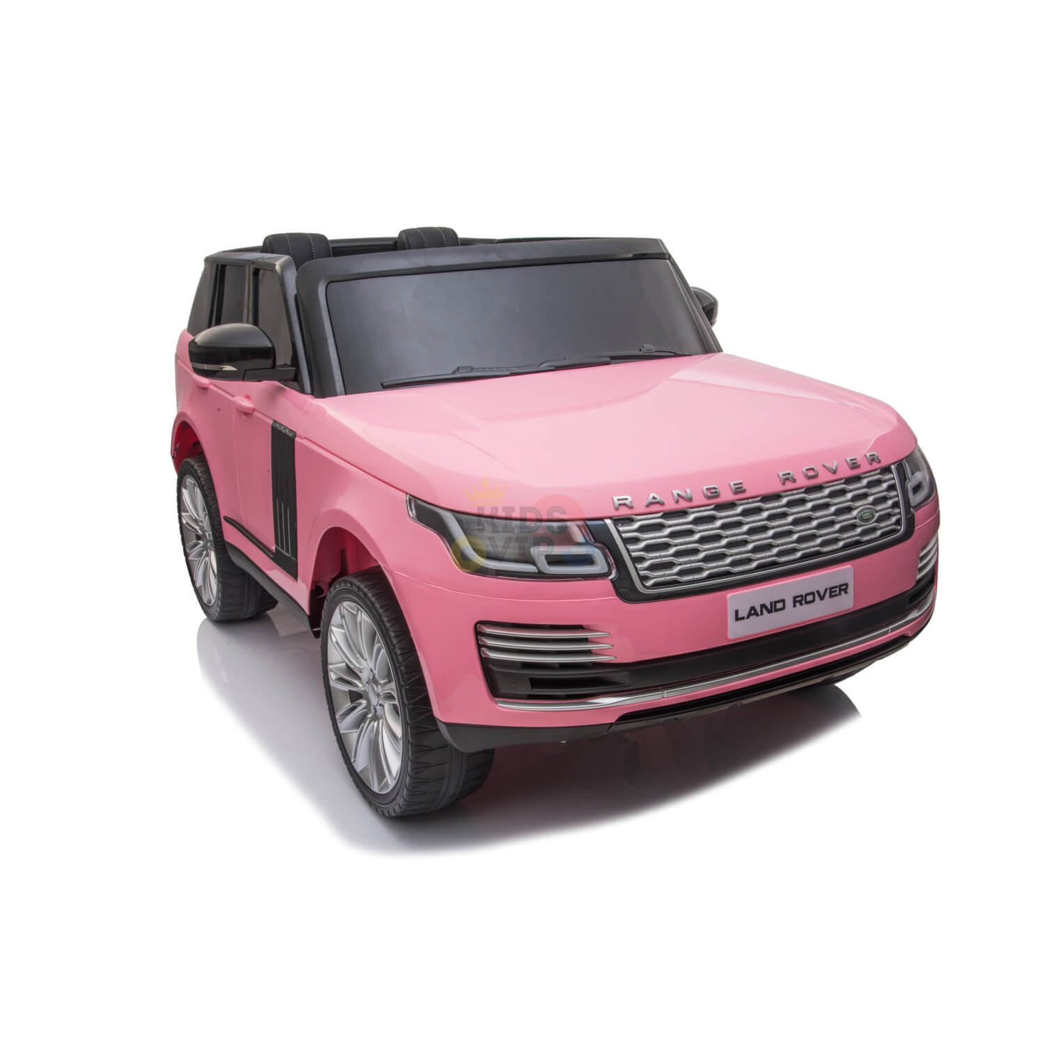 The Pink 24V Official Range Rover Complete MP4 Edition Kids Ride On Car features realistic headlights, the iconic logo, and shiny silver wheels. Its showcased with detailed front features from a front angle on a white background.