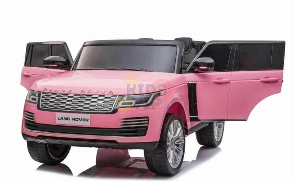 The Pink 24V Official Range Rover Complete MP4 Edition Kids Ride On Car with RC features open front doors, a detailed grille, and large wheels. This convertible toy reveals visible seats inside, perfectly blending style and fun for young adventurers.