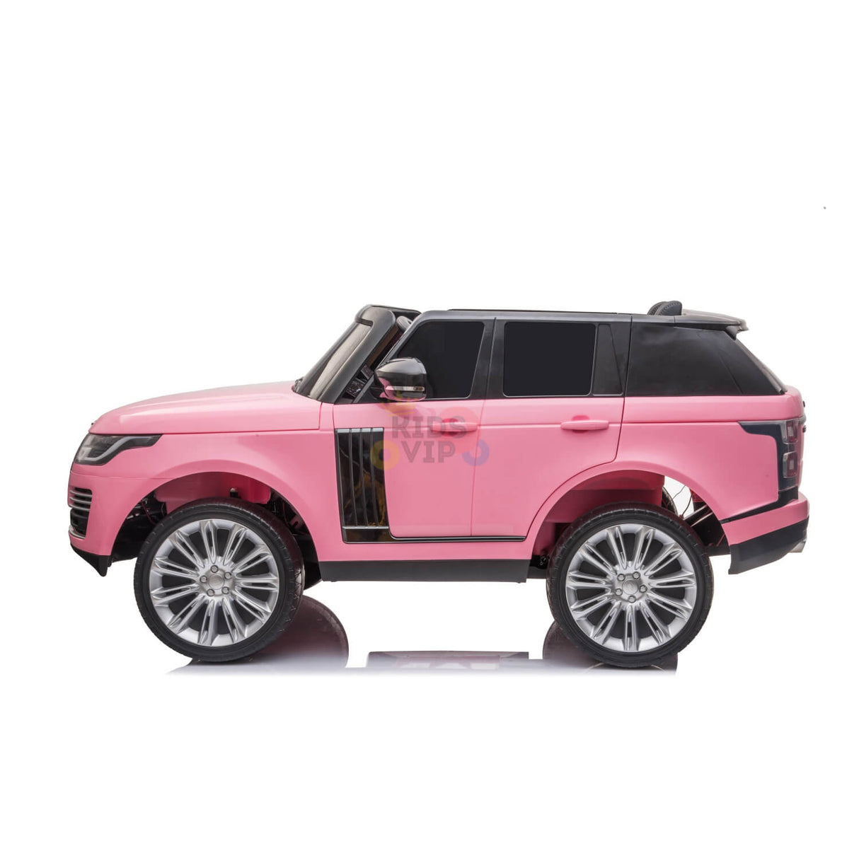 Side view of a Pink 24V Official Range Rover Complete MP4 Edition Kids Ride On Car with RC featuring silver wheels on a white background.