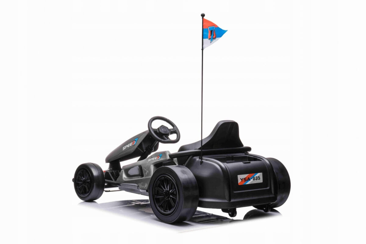 The Grey Big Kids 24V Ultra-Violent Complete Edition Drifting Go-Kart is shown from the rear angle, featuring 24V motors, a single seat, four wheels, a small steering wheel, and a flag with red, blue, and black colors attached to a pole at the back.