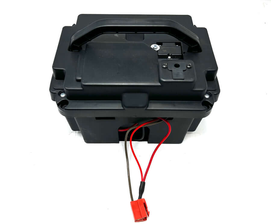 A black 24V battery pack for a Can-am Maverick with visible wiring.