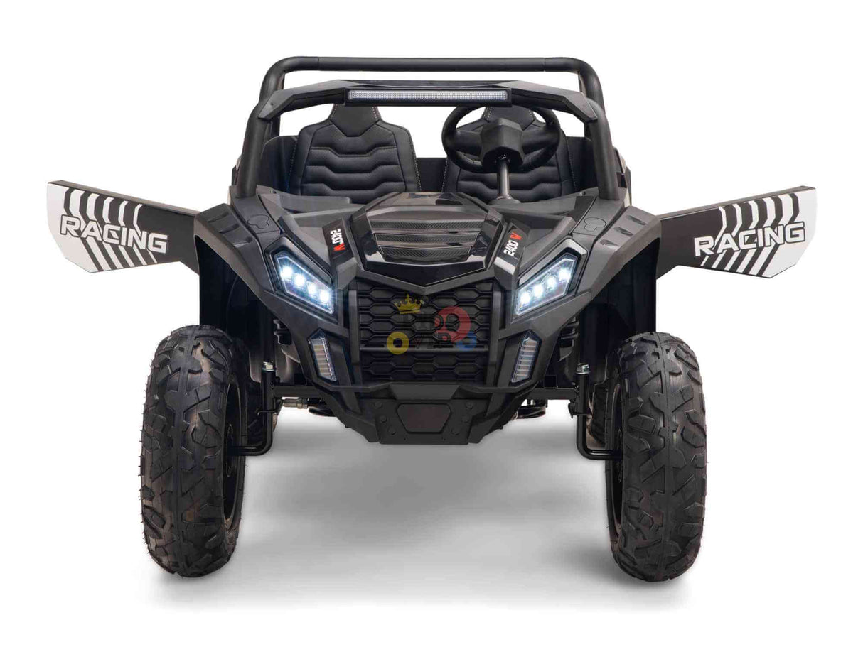 A front view of the Black 24V/180W XXL Big Kids Blade XR Ride on Buggy, resembling an off-road vehicle with inflatable rubber tires, a steering wheel, LED headlights, and Racing decals. Suitable for children.