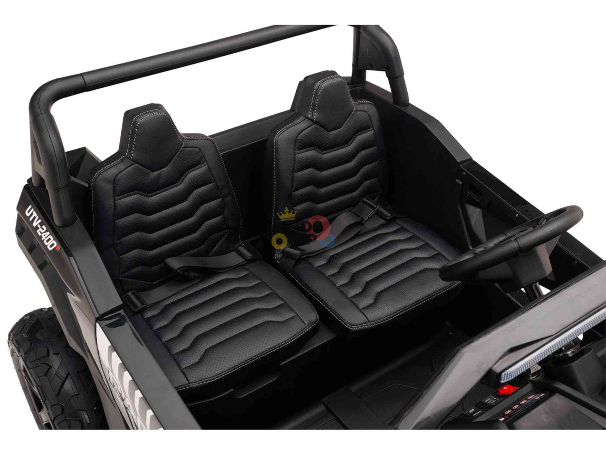 The Black 24V/180W XXL Big Kids Blade XR Ride on Buggy features an ECO leather interior with seat belts, basic dashboard controls, and a steering wheel. Its rugged inflatable rubber tires and roll bar highlight its adventurous spirit.