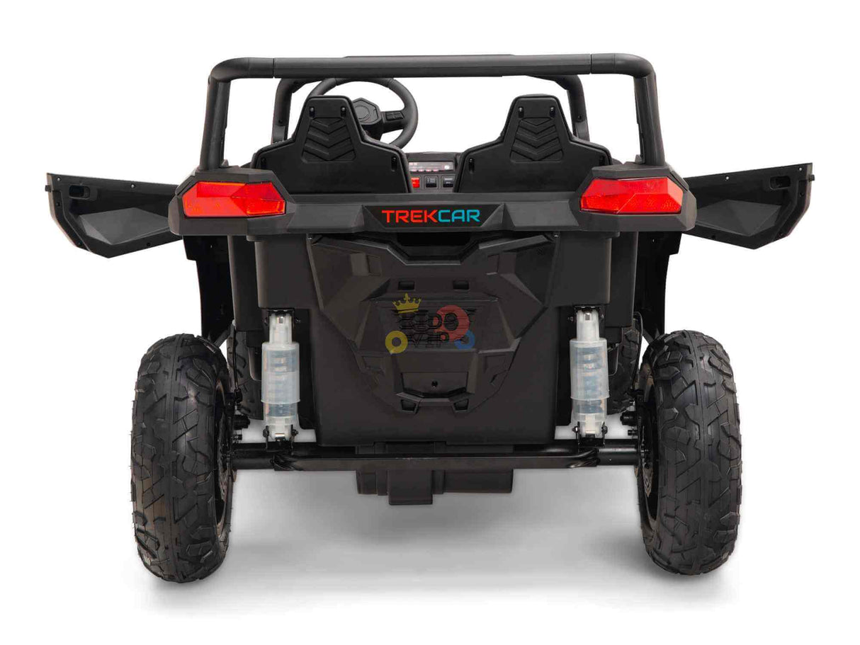 The Black 24V/180W XXL Big Kids Blade XR Ride on Buggy features a rear view with two ECO Leather Seats, open doors, and an impressive steering wheel. It has large inflatable rubber tires and showcases the Trekcar brand on the back.