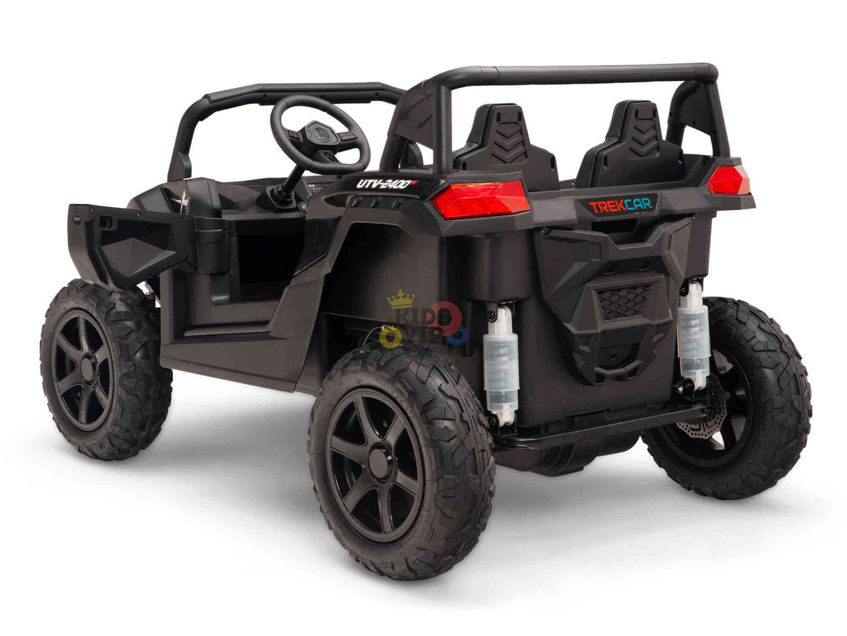 The Black 24V/180W XXL Big Kids Blade XR Ride on Buggy, resembling an ATV, is seen from the rear angle. It features large wheels and a steering wheel with a sporty Trek Car logo at the back.