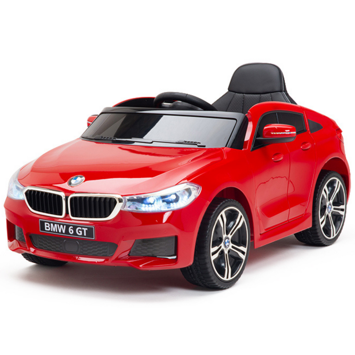 The Red 12V BMW GT Kids Licensed 1 Seater Ride On Car features black seats, a windshield, and illuminated front lights, capturing the sleek design of a real BMW for an authentic driving experience.