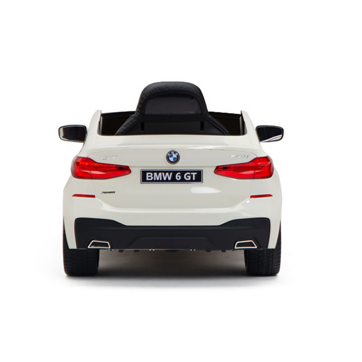 View of the rear of a licensed BMW ride-on car for kids, styled like a BMW 6 GT with black interior, side mirrors, detailing for realism, and a BMW 6 GT license plate.