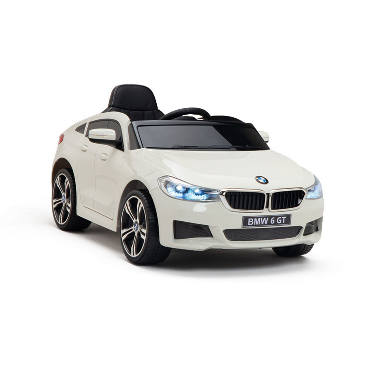 The White 12V BMW GT Kids Licensed 1 Seater Ride On Car features blue-tinted headlights, a black seat and steering wheel, detailed grills, realistic alloy wheels, rubber wheels, remote control functionality, and proudly displays BMW 6 GT on the front plate.