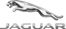 Silver jaguar logo leaping over the word JAGUAR in bold, metallic letters on a black background.