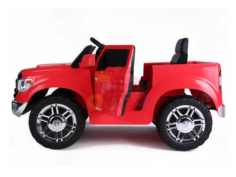 The side view of the bright red 12V Licensed Upgraded Toyota Tundra 1 Seater Kids Ride On Truck features large black and silver wheels, a detailed front grille, black seats, and an open design. Offering parental remote control, this ride-on ensures safe adventures for kids.