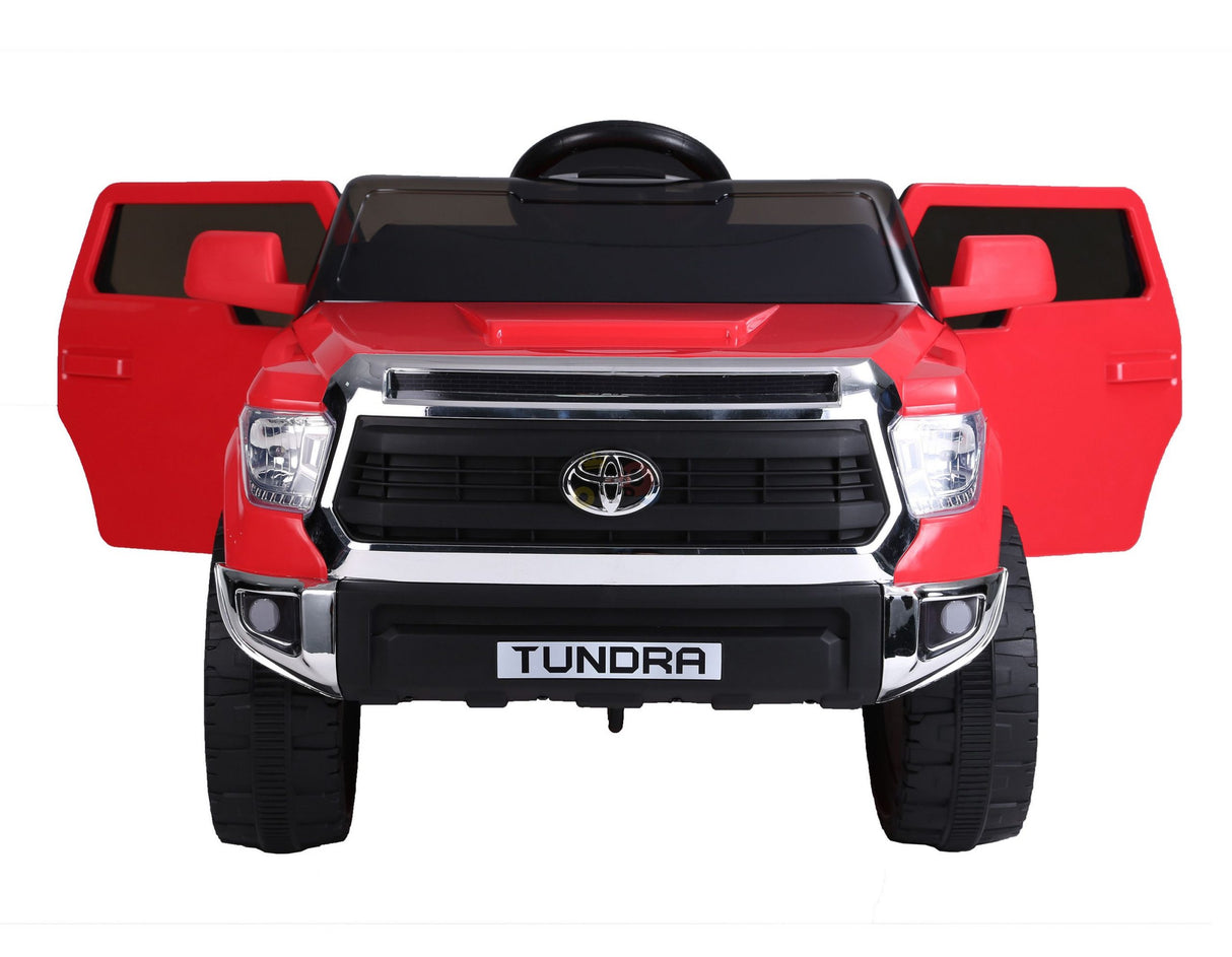 The Red 12V Licensed Upgraded Toyota Tundra 1 Seater Kids Ride On Truck with RC features open doors, large black wheels, a bold front grille, TUNDRA on the front plate, a visible steering wheel through the windshield, and includes a parental remote control for safety.