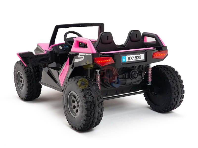 Introducing the Pink 24V/4X4 Dune Buggy Ride On UTV: a vibrant toy car with rugged rubber wheels, dual seats, visible steering wheel, and striking red triangular lights. It showcases an eye-catching pink and black design and is equipped with the license plate SX1928.