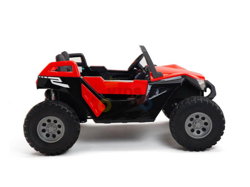 Introducing the Red 24V/4X4 Dune Buggy Ride On UTV: a red and black off-road toy with rugged rubber wheels, an open cockpit, and sporty ATV-like design. Comes with Parental Remote Control for added safety.