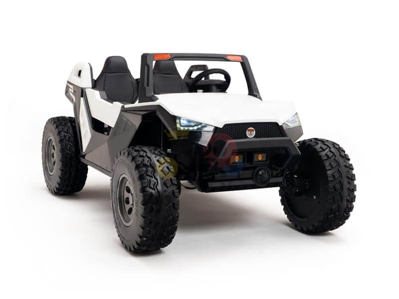 The White 24V/4X4 Dune Buggy Ride On UTV, resembling an off-road vehicle, features rubber wheels, large tires, a steering wheel, open seating, headlights, and a roll cage. Painted in white and black with rugged details for adventurous young explorers.