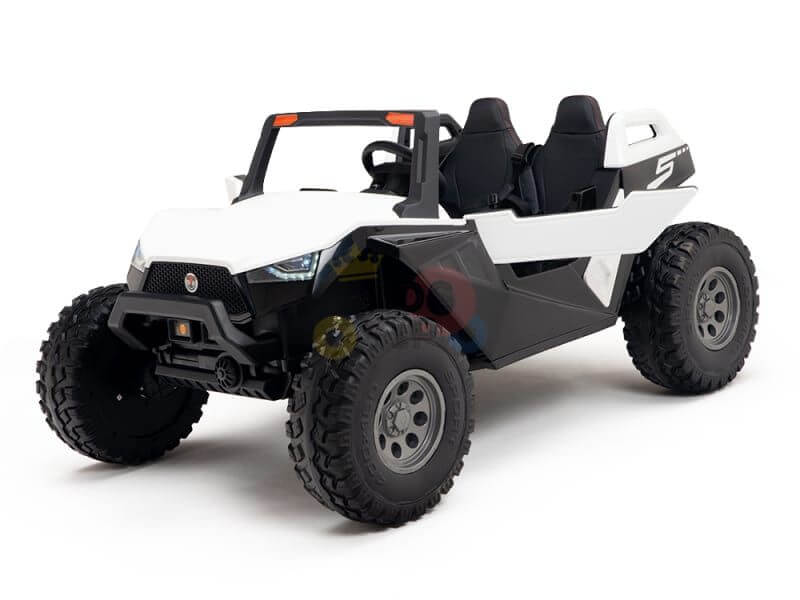 The Kids XXL Edition, a White 24V/4X4 Dune Buggy Ride On UTV, boasts large rubber wheels, two seats, and an angular design. Its robust build and sporty look are highlighted against a plain white background.
.