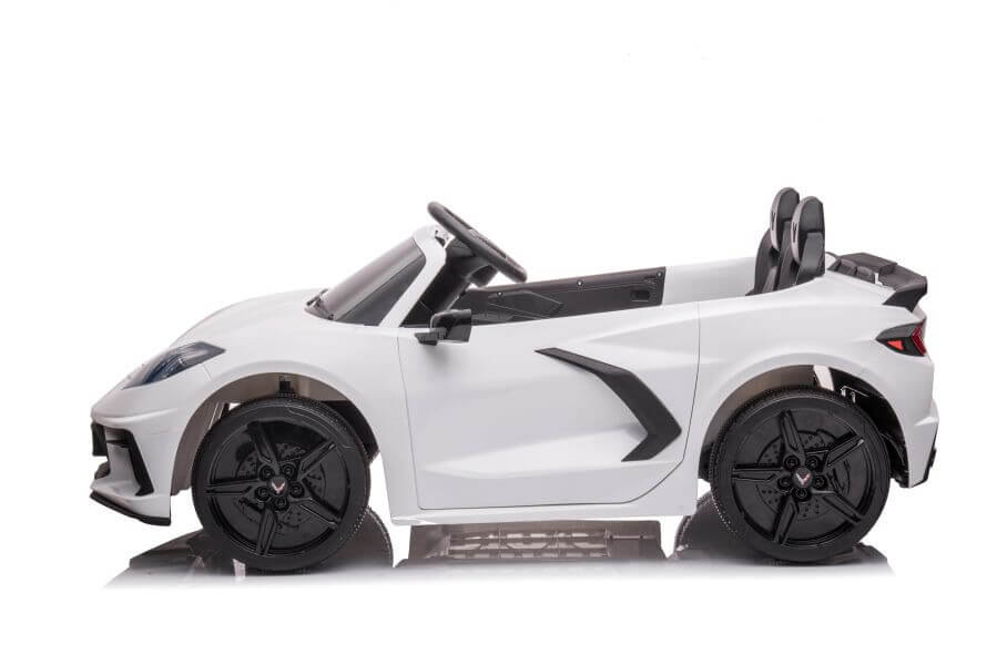 The Kids Premium 24V White Corvette C8 Dual-Seater is a sleek, convertible toy car with black EVA wheels and leather seats for comfort. Its aerodynamic design resembles a sports car, making it ideal for young driving enthusiasts. The car also includes a realistic steering wheel and remote control.