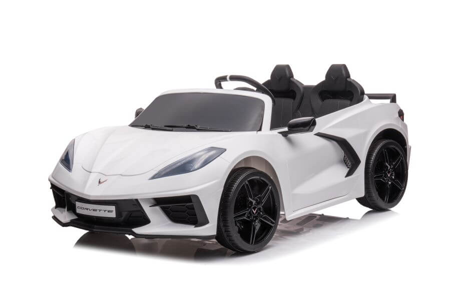 The Kids Premium 24V White Corvette C8 Ride-On features EVA wheels, black accents, leather seats for two, sharp headlights, a small front logo, detailed rims, and a sleek design.