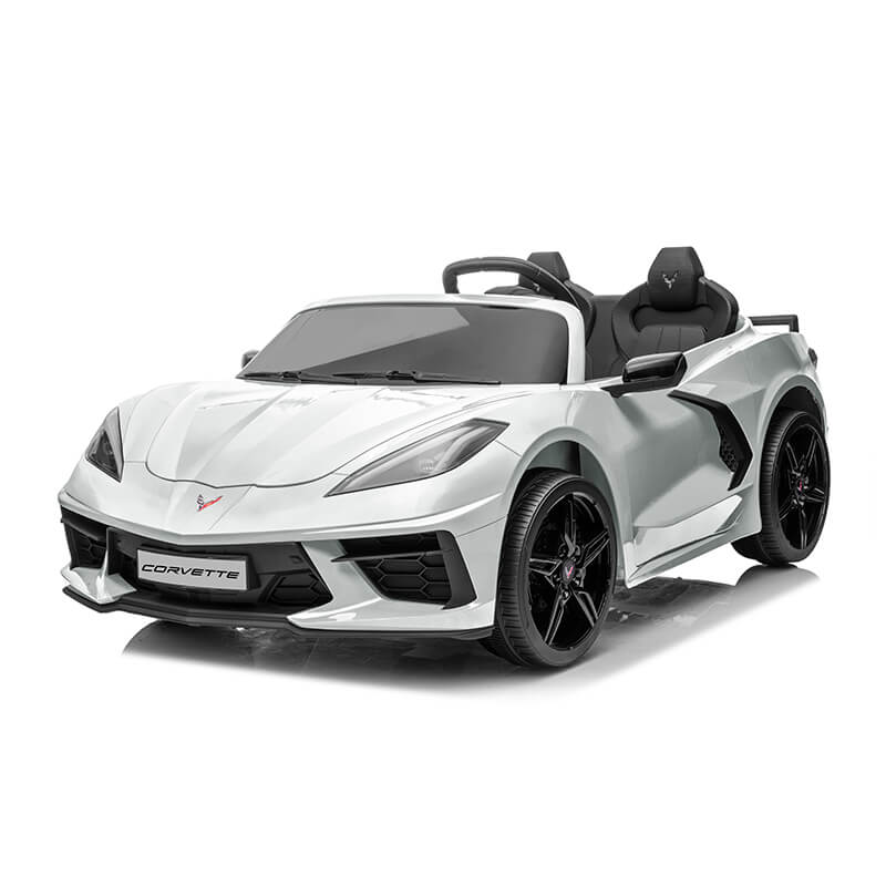 The Kids Premium 24V White Corvette C8 Dual-Seater is a stylish toy car for kids with sporty black details, EVA wheels, leather seats, and a logo on the front. It features a detailed grill, realistic windshield, and comes with remote control.