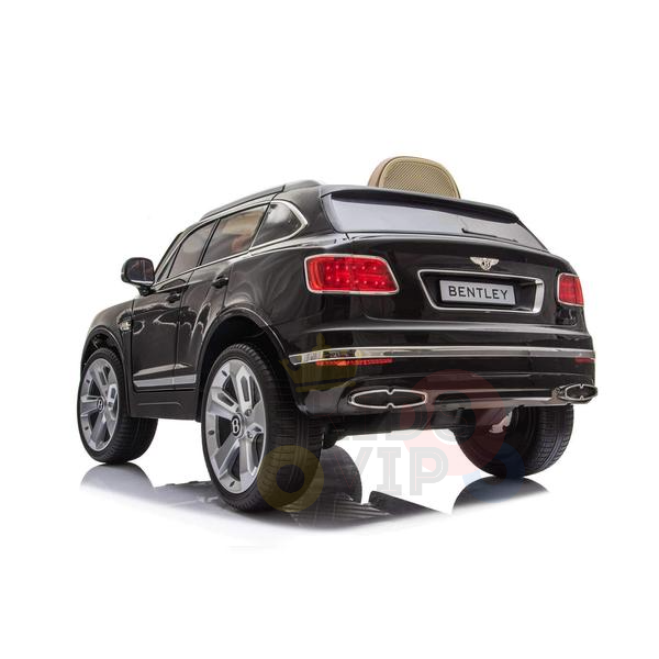 The Black Licensed Bentley Bentayga Complete Edition 12V Kids Ride On Car With RC is a realistic black SUV replica featuring red taillights, chrome accents, a leather seat, and a visible Bentley logo. It offers parental control via an RC, emphasizing its rear and side details.