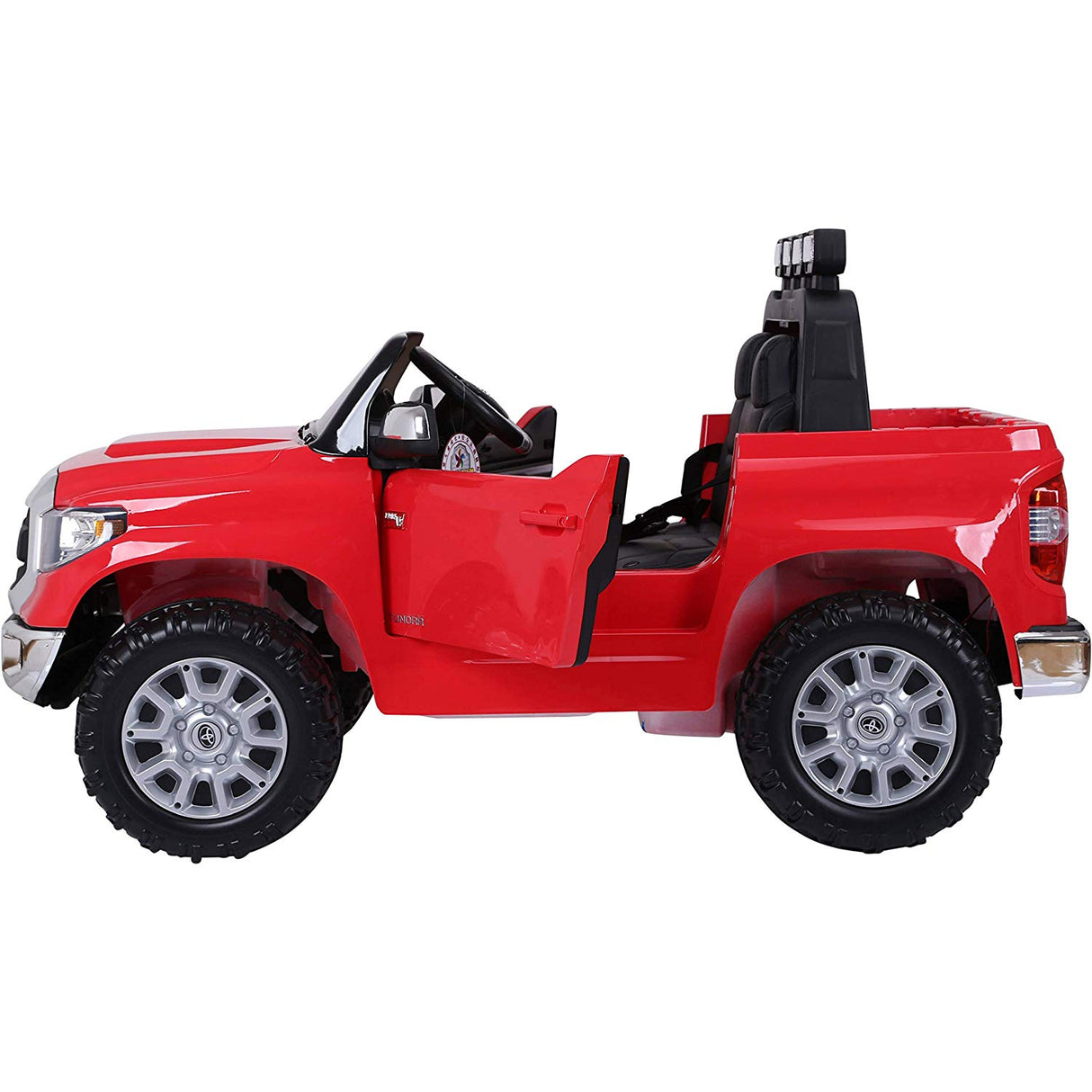 Introducing the Red 12v Licensed Toyota Tundra, a stylish kids ride-on truck. This modern toy features an open-top design with a detailed interior, ajar drivers side door, black seats, large silver wheels, and off-road tiresβall set against a plain white backdrop.