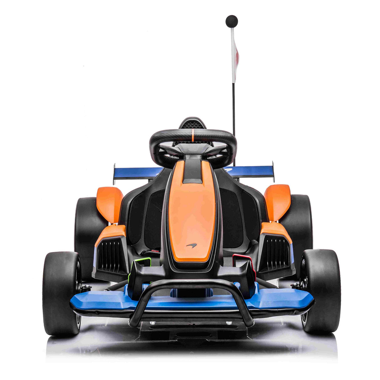 The front view of the Orange 24V Official Complete Edition McLaren Super Drifting Go-Kart shows off its sleek design in orange and blue with black accents, featuring wide tires, a small steering wheel, and a rear flag, set against a plain white background. Ideal kids ride-on.