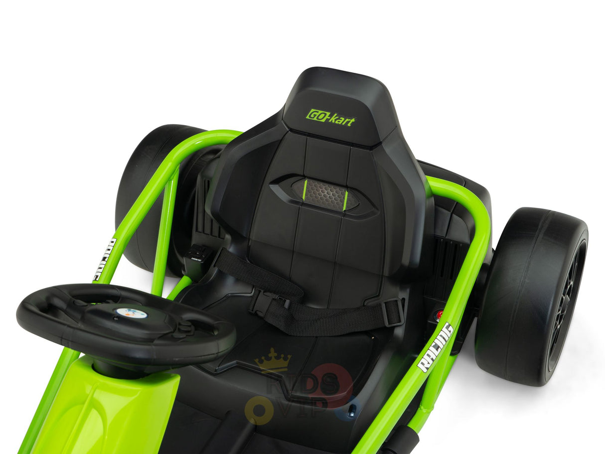 Close-up of a green go-kart seat and steering wheel. The Green 24V Sport Challenger Outdoor Drifting Kids Go Kart features a black seat with a safety harness, perfect for racing. GO Kart branding on the headrest highlights its thrilling design.
