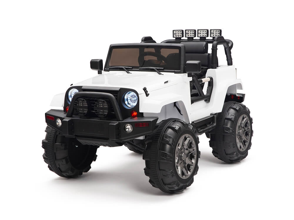 The White 12V Sport Edition Trailcat Big Wheels Kids Ride on Truck with RC is designed like an off-road SUV, featuring large tires, a front grille, and overhead lights. Suitable for children, it includes a parental remote for added safety and fun.
